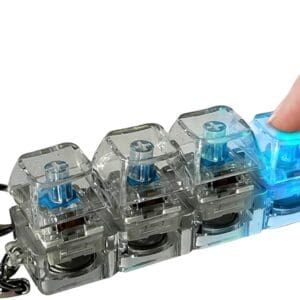Mini mechanical keyboard fidget sensory toy keychain with transparent blue click switches for stress relief and focus – portable keyboard clicker toy in Lebanon