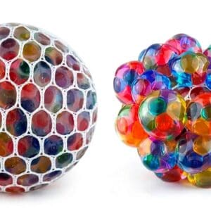 A product photo showcasing two types of stress relief toys on a plain white surface. On the left is a perfectly round ball, filled with multi-colored (red, blue, green, yellow, orange) water gel beads that are contained within a tight white hexagonal mesh net. On the right is a loose, grape-like cluster of similar larger, colorful water gel beads, showing the textures and translucence of the individual spheres.